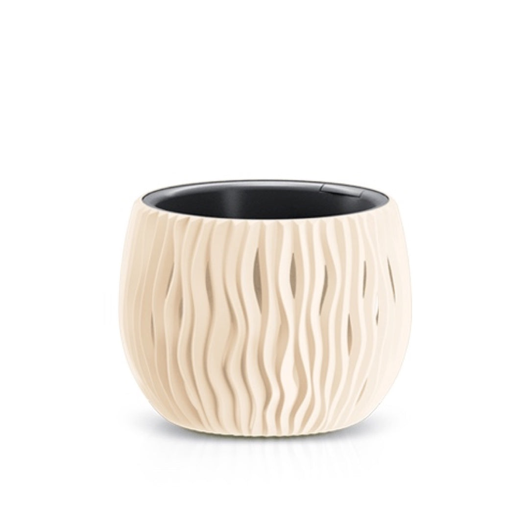 Doniczka Sandy Bowl Prosperplast w kolorze kremowym, na białym tle