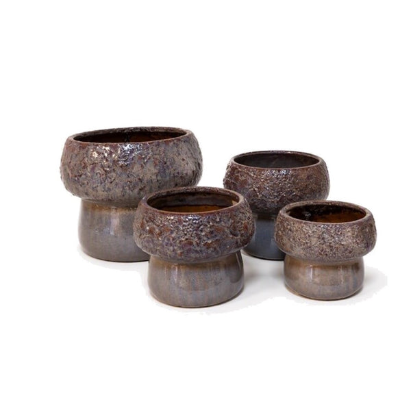 Komplet czterech ceramicznych osłonek Echo CD002 w antycznym brązie, o chropowatej szkliwionej górnej części i gładkim cokole