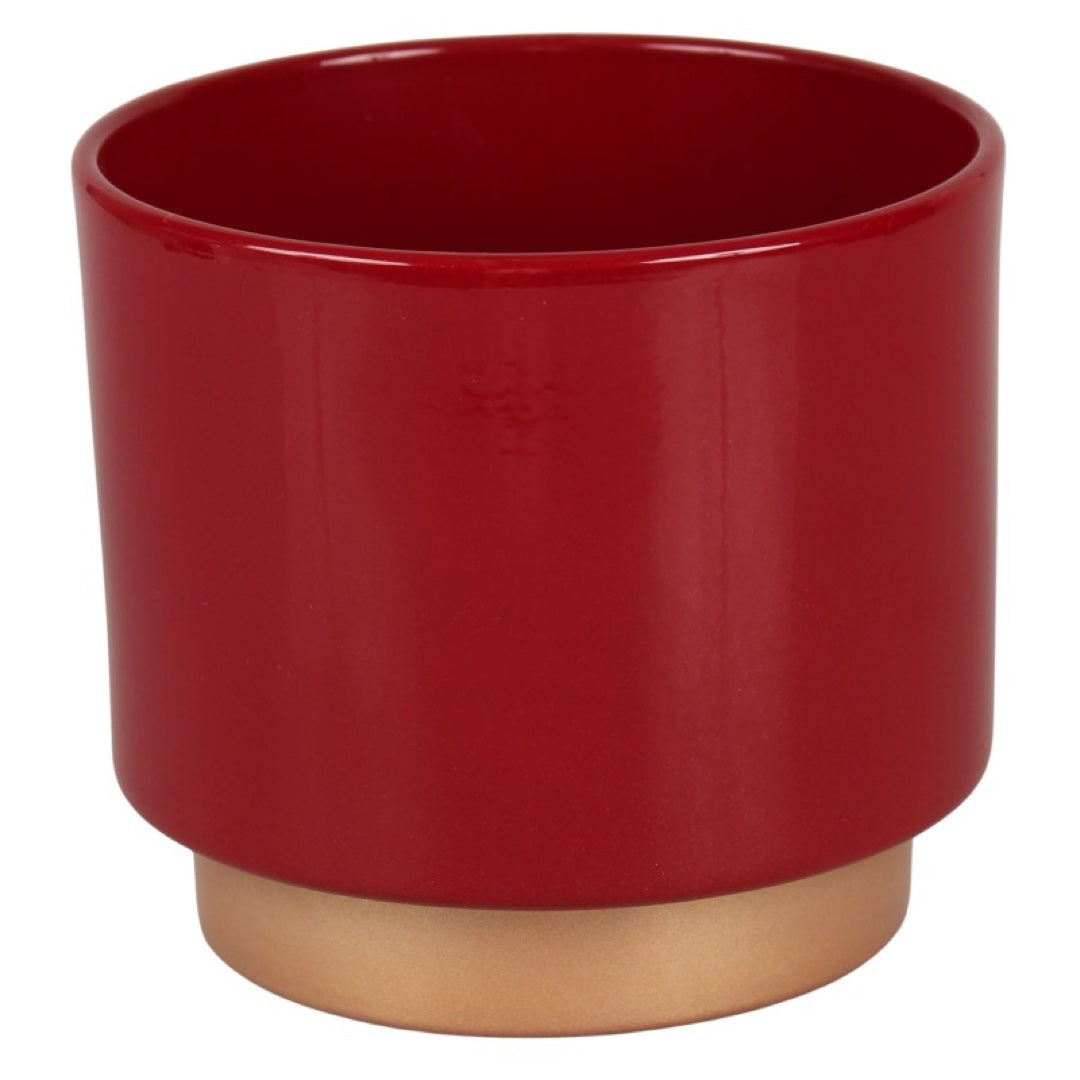 Czerwona ceramiczna osłonka Cermax 930 ze złotą podstawą na białym tle