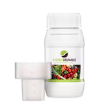Butelka 250 ml stymulatora wzrostu Florahumus Liquid na białym tle