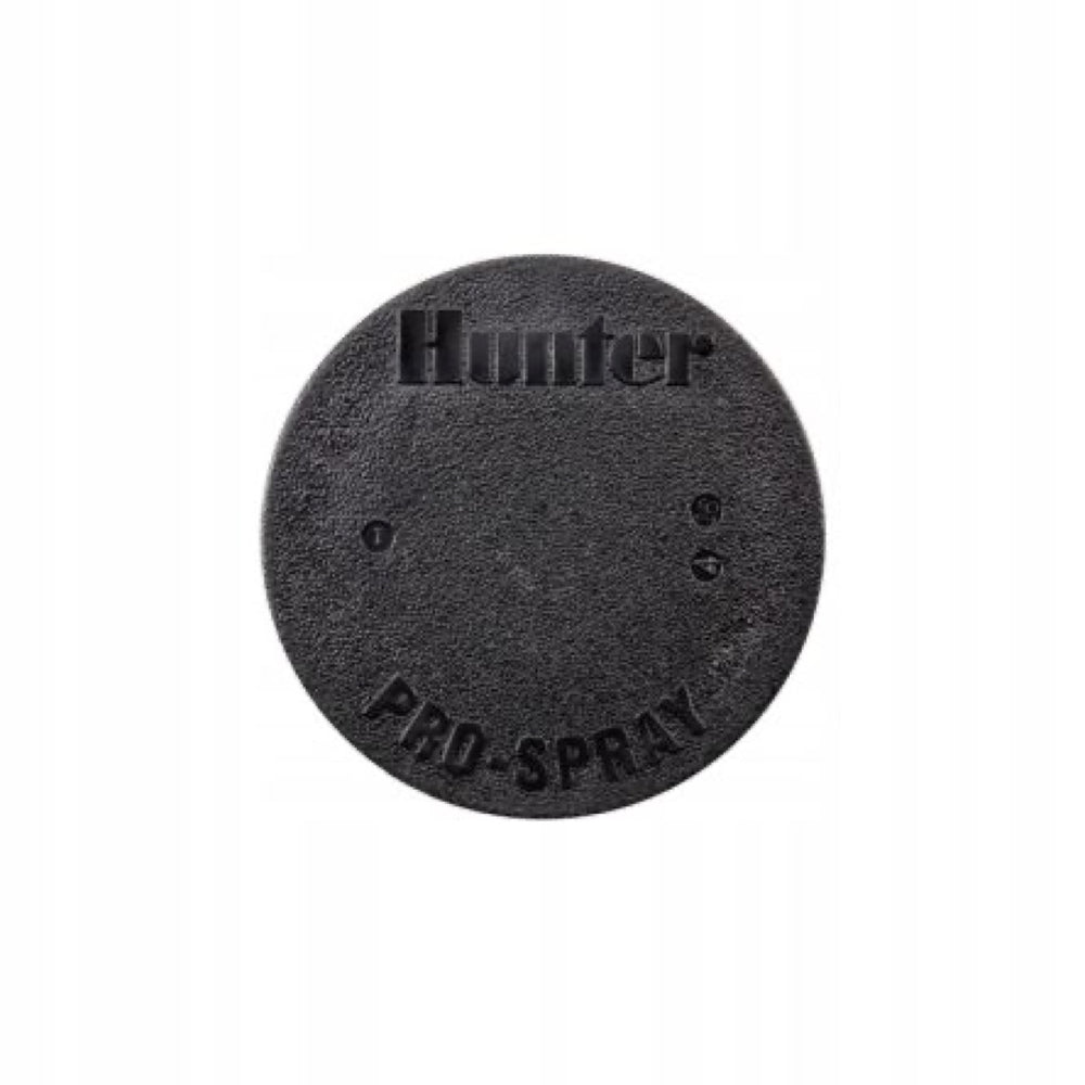 Czarny korek korpusu zraszacza Hunter PROS-04 z napisem Pro-Spray na białym tle
